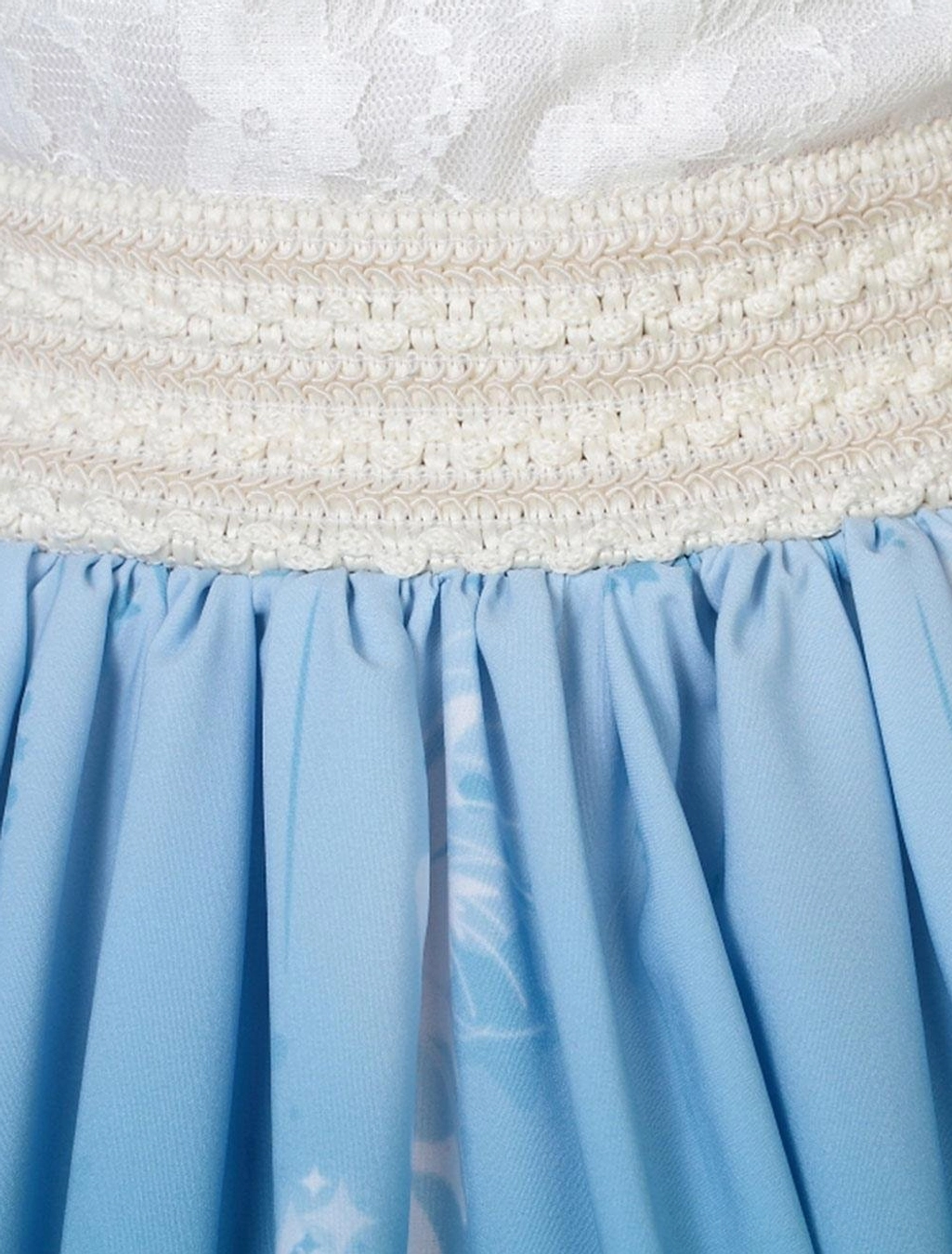 Close-up detail of sweet lolita SK skirt waistband showing cream smocked elastic waist with pleated fabric construction