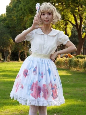sweet lolita skirt betta fish print white doll collar puff sleeve blouse front full body view blonde model flower hairpin outdoor