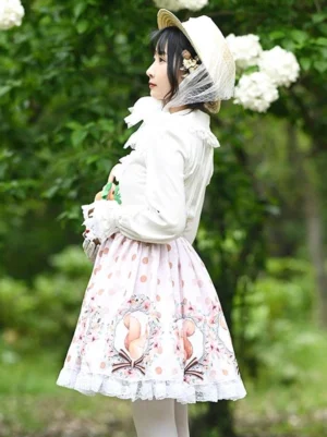 Sweet lolita skirt side profile view showing A-line silhouette, floral and squirrel themed prints, high-waisted design with decorative bows and lace hem detail