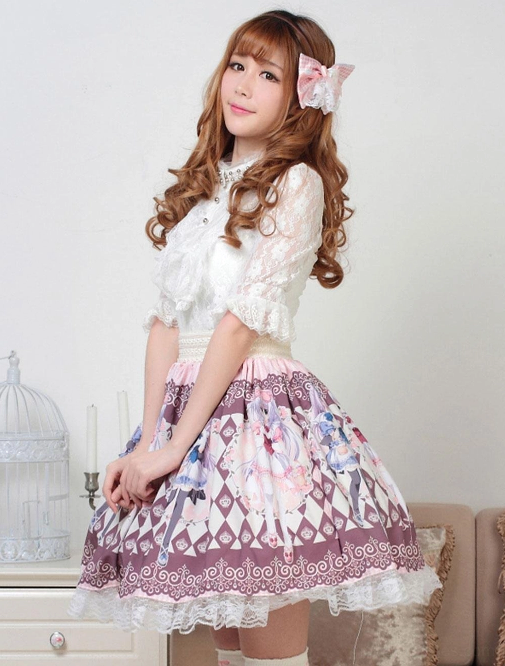 Side three-quarter view of purple sweet lolita skirt showcasing fitted high waist, argyle print pattern, and decorative lace hemline with model detail