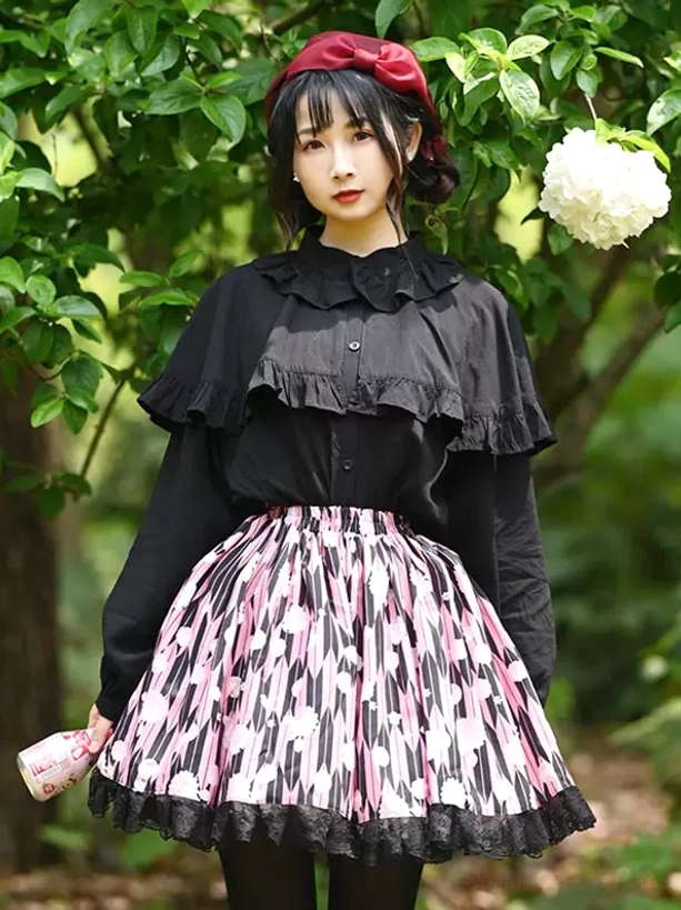 Sweet lolita SK skirt outfit three-quarter view with model holding cup black lace skirt hem detail red beret