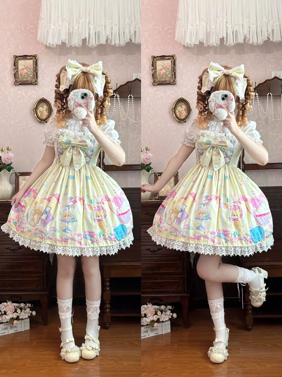Sweet lolita sleeveless dress flat lay photography showing complete dress structure, bow placement, lace ruffle hem, print design, and silhouette proportions
