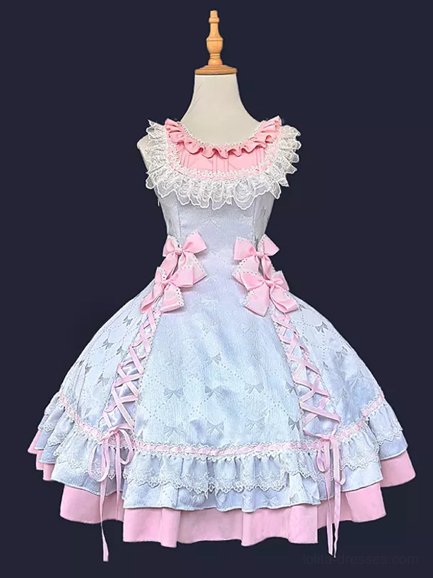 Sweet lolita sleeveless dress with multi-layer ruffled hem and decorative waist bows displayed on dress form, front view showing pink lace collar and side lace-up construction