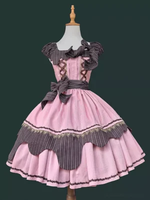 Pink sweet lolita sleeveless jumper dress with lace-up bust detail and layered ruffled skirt, shown on dress form mannequin from front angle