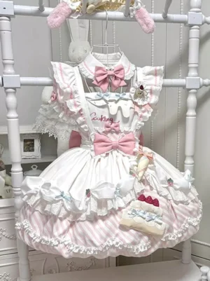Sweet Lolita strawberry cake pink striped dress with lace ruffles and bow front view flat lay on white clothing rack