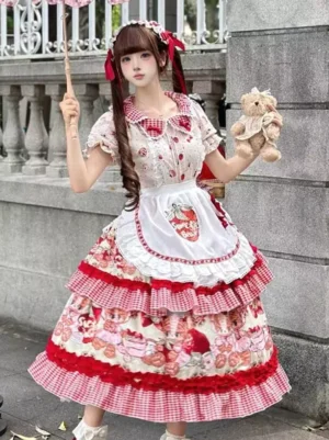 Sweet lolita strawberry dress with red gingham collar layers, model holding parasol and teddy bear, outdoor architecture