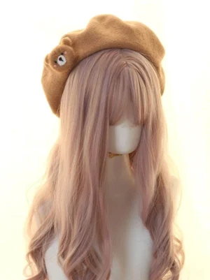 Sweet lolita camel brown wool beret with teddy bear embellishment front three-quarter view on mannequin with pink hair