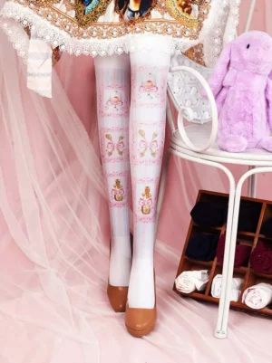 Sweet lolita thigh-high stockings with bunny print displayed on model's leg in front view, white stocking base featuring pink decorative rabbit and frame prints, styled with pink studio background and adorable plush rabbit toy