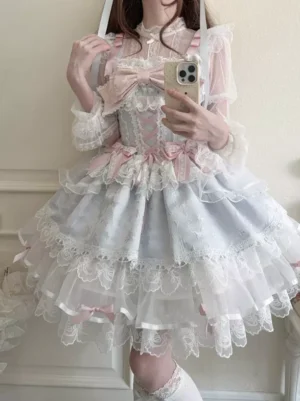 Sweet lolita tiered lace JSK dress spaghetti strap front view selfie pink light blue bow details