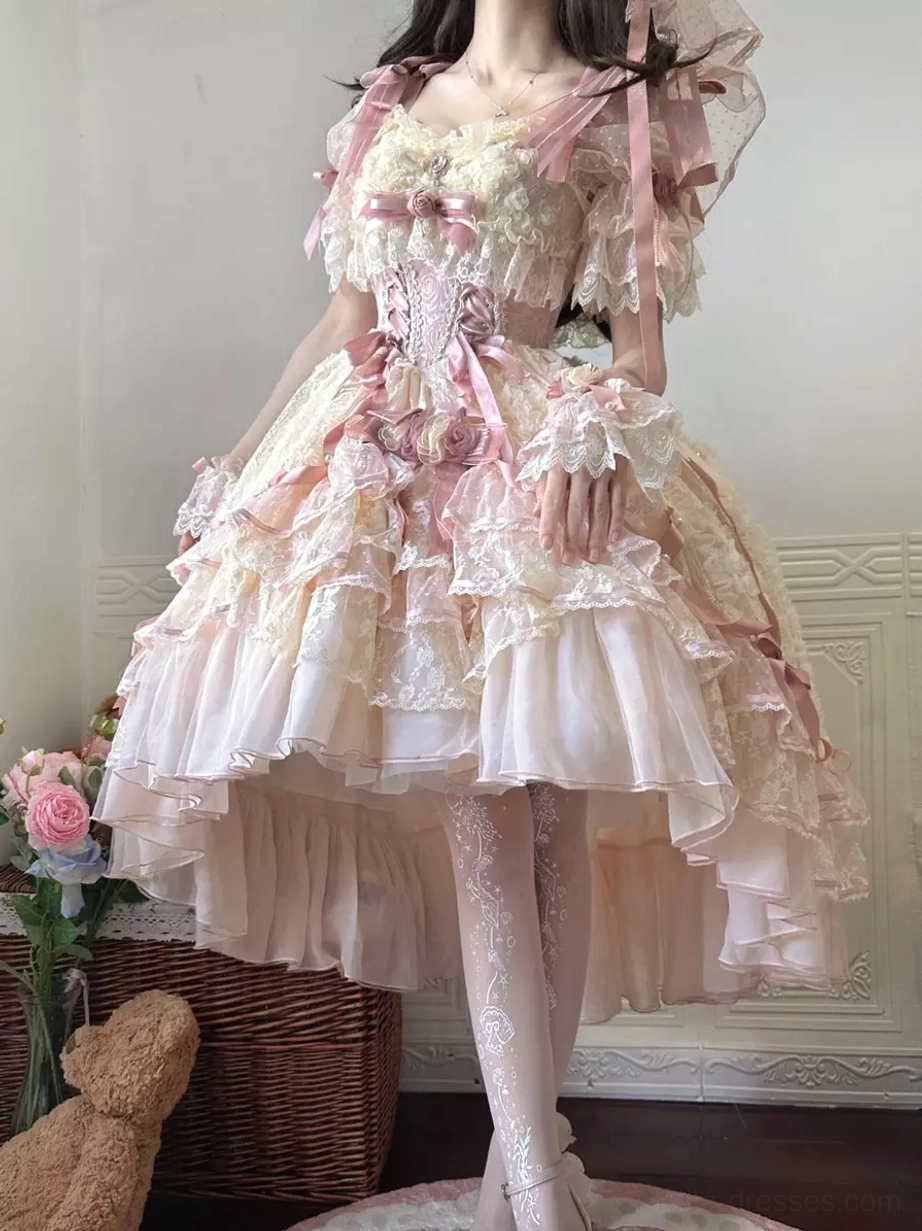 Back full body view of sweet lolita wedding dress displaying layered ruffled skirt construction sheer lace tights and bridal elegance