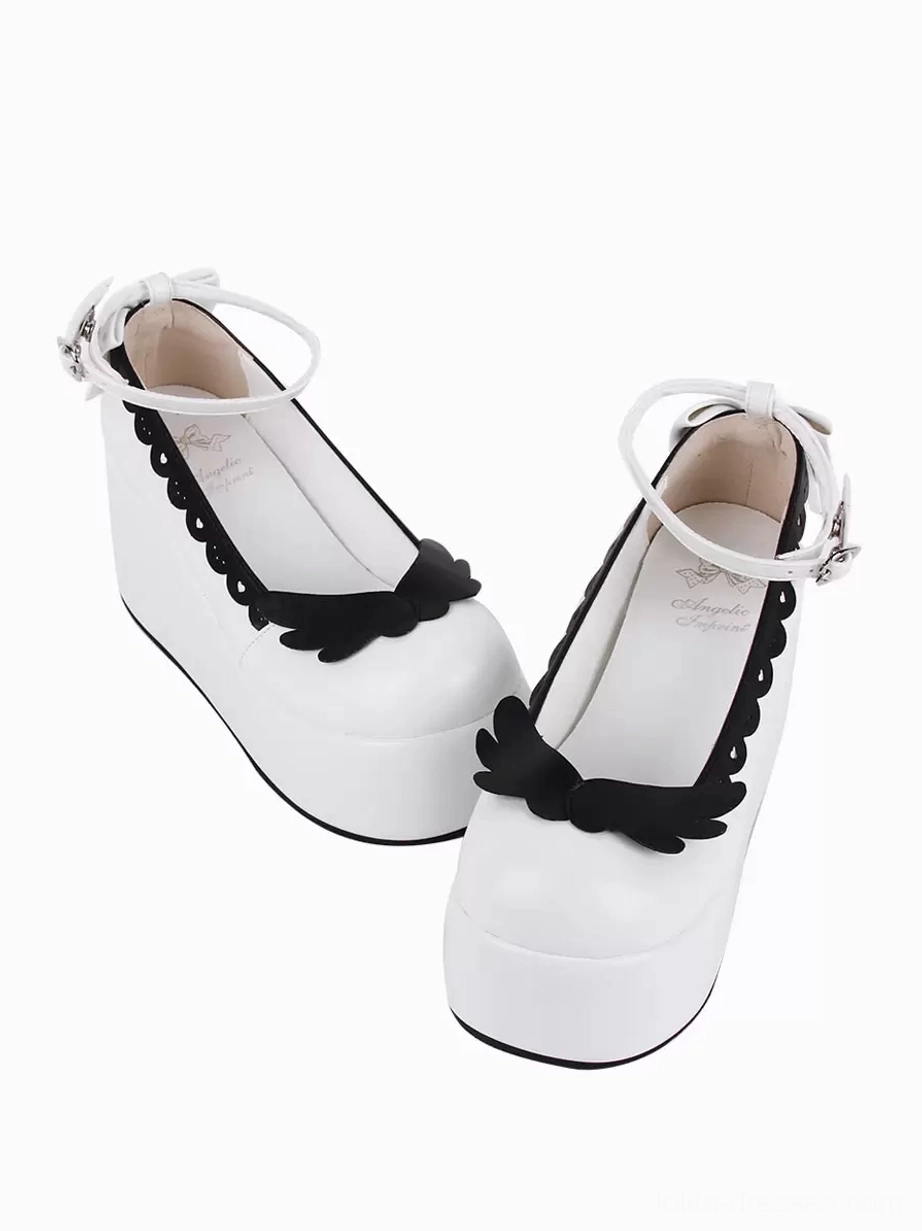 Sweet Lolita wedge pumps side front paired view showing black butterfly on toe cap scalloped collar ankle strap with bow detail