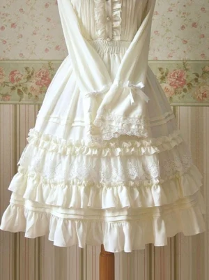 Off-white sweet lolita chiffon ruched skirt front view displayed on dress form with lace-trimmed sleeves and tiered ruffled lace hem
