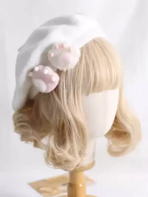 White fluffy Lolita beret with pink cat paw charms worn on mannequin model side back view perspective