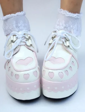 Sweet Lolita white heart lace-up platform shoes front view with pink heart accents glossy PU leather and ruffled lace ankle socks