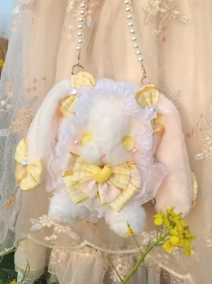 Cute Sweet Lolita white plush rabbit crossbody bag with yellow-pink gingham bows and ruffled lace, pearl chain strap, adorable character design with warm gradient eyes, elegant Lolita accessory for tea parties and casual wear