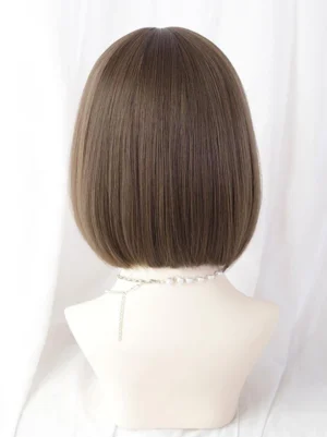 Short synthetic lolita wig back view showing uniform ash brown straight bob cut with neatly trimmed ends and pearl necklace styling