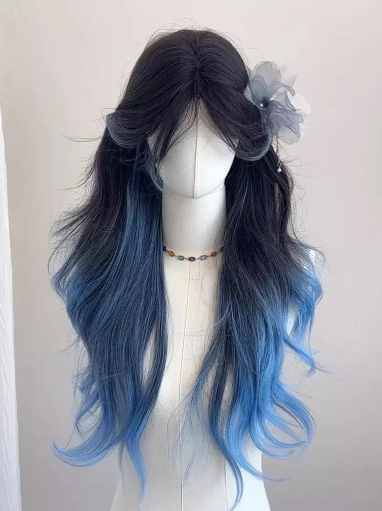 Blue ombre long wavy Lolita wig front three-quarter view on mannequin with blue flower hairpin and beaded choker accessory