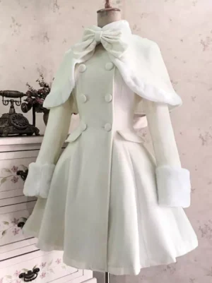 Sweet lolita winter coat white with large red bow shawl collar fuzzy faux fur trim double-breasted buttons front three-quarter view dress form vintage indoor setting
