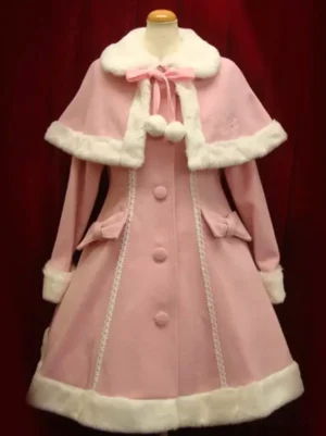 Pink Sweet Lolita wool winter coat with detachable cape featuring white faux fur trim, decorative bow with pom-poms at neckline, front button fastenings, lace side panels, and A-line flared silhouette - front view