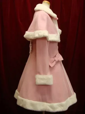 Sweet Lolita wool overcoat with detachable cape and faux fur trim showcasing side profile details including waist bow decoration, flap pockets, flowing A-line hem, and layered cape construction