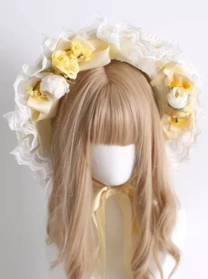 Sweet Lolita yellow floral bonnet front view with white ruffled lace and satin ribbons on mannequin