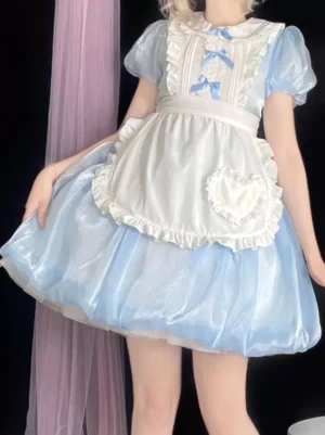 Blue and white sweet maid lolita dress with removable heart apron, puffed short sleeves, and shiny bubble skirt with blue bow details, front full-body view on female model against pink sheer curtain background