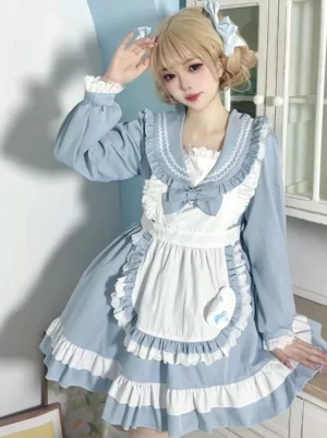 Blue sweet lolita maid dress front three-quarter view showing cross bow and lace cuff details