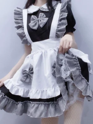 Sweet maid Lolita dress three-quarter front view with gingham trims black and white colorway layered ruffled hem bow decorations