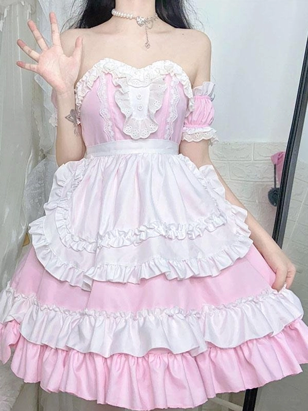 Sweet maid Lolita dress side profile view with pearl choker pendant, ruffled apron layers, and complete coordinate styling near mirror