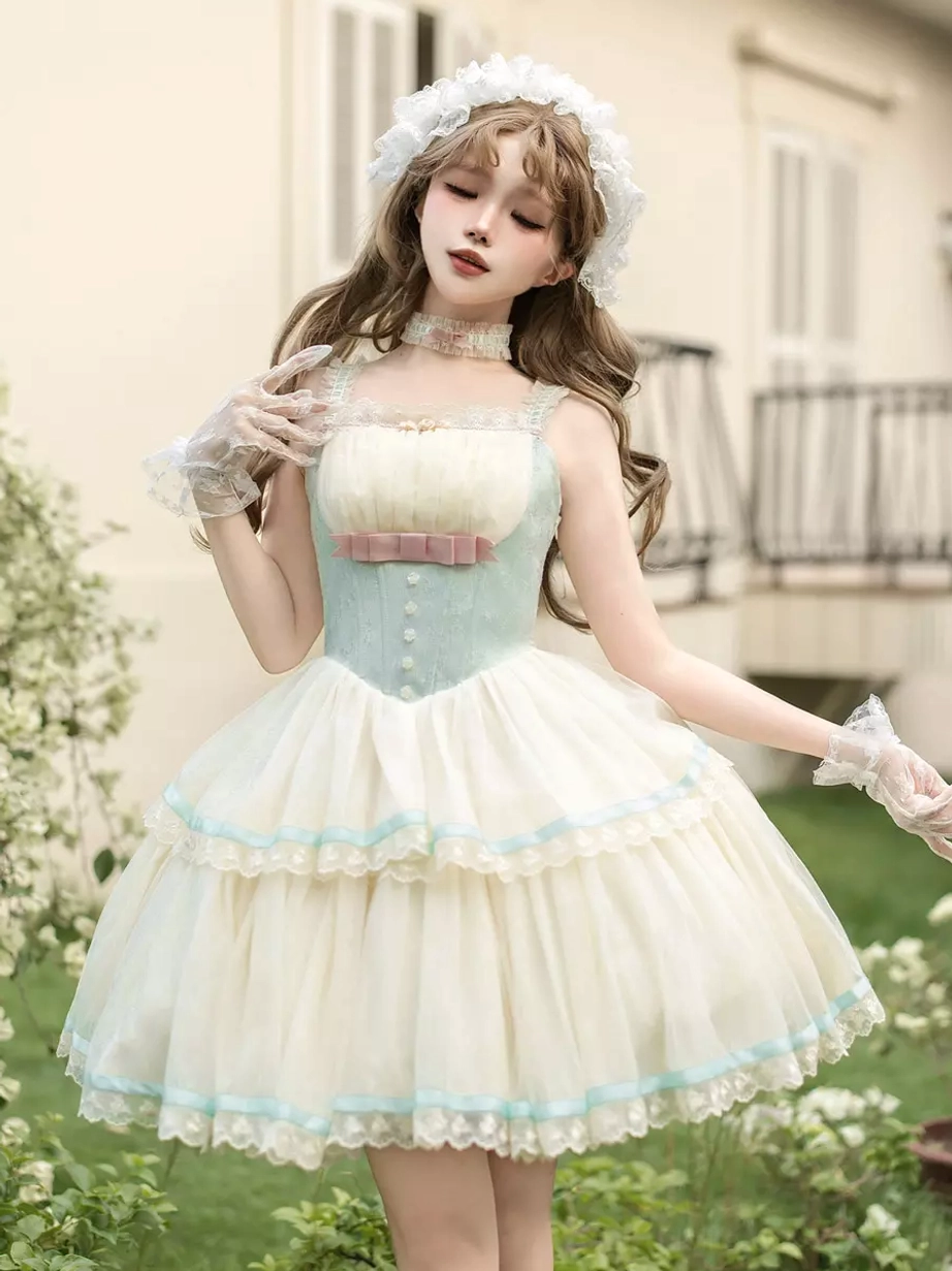 Sweet mint fairy lolita JSK corset dress cream tulle with mint bodice front close-up outdoor garden model wearing full ensemble