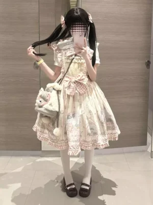 Sweet pink short-sleeve lolita dress with ruffled Peter Pan collar and front gingham bow worn in three-quarter mirror selfie showing full sweet lolita coordination