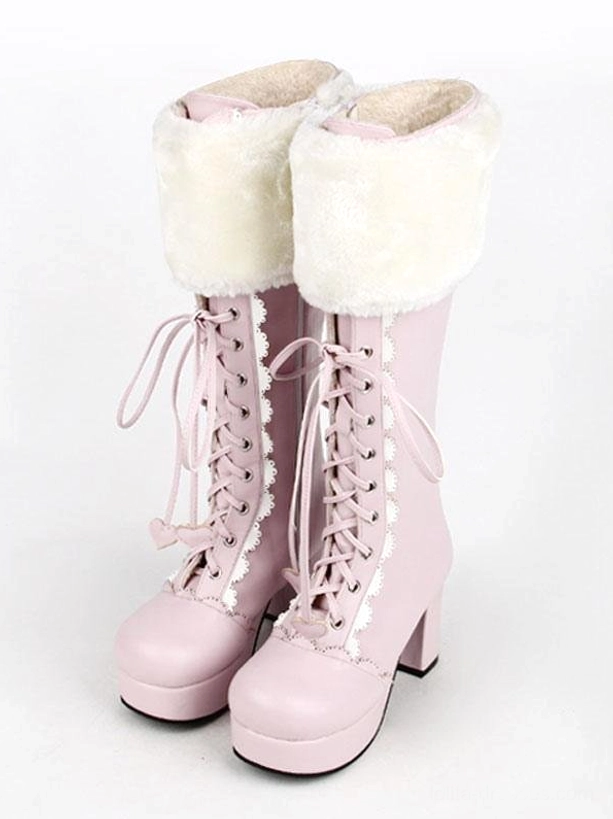 Sweet pink lolita platform boots front three-quarter view with fluffy white faux fur cuff, lace-up front detailing, and chunky platform heel, displayed on white background