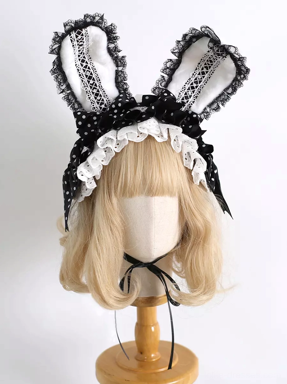 Sweet rococo lolita bunny ear headdress showcasing intricate lace embellishment and bow details close-up view