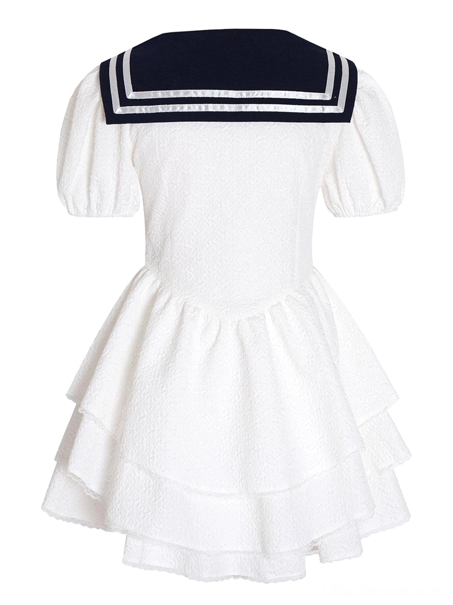 Flat lay rear view of sweet sailor lolita dress showing striped navy sailor collar puff sleeves and layered ruffle skirt back detail
