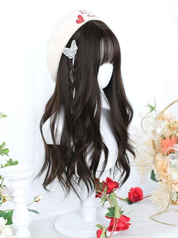 Tan brown long wavy lolita wig with air bangs styled on mannequin head, featuring heart-decorated beret and butterfly hair accessories, displaying three-quarter front view with romantic floral props