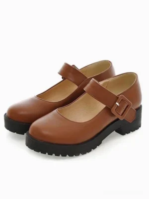 Tan brown Mary Jane Lolita platform shoes front three-quarter view on white background, displaying adjustable buckle strap and chunky black lug sole details