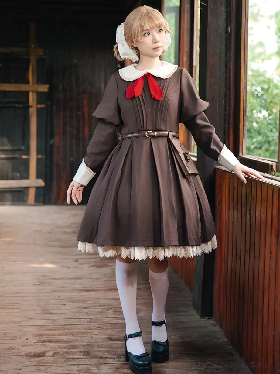 Classic tan colored lolita dress with long sleeves and knotted embellishment details displayed on dress form, showing alternative color option for this timeless style