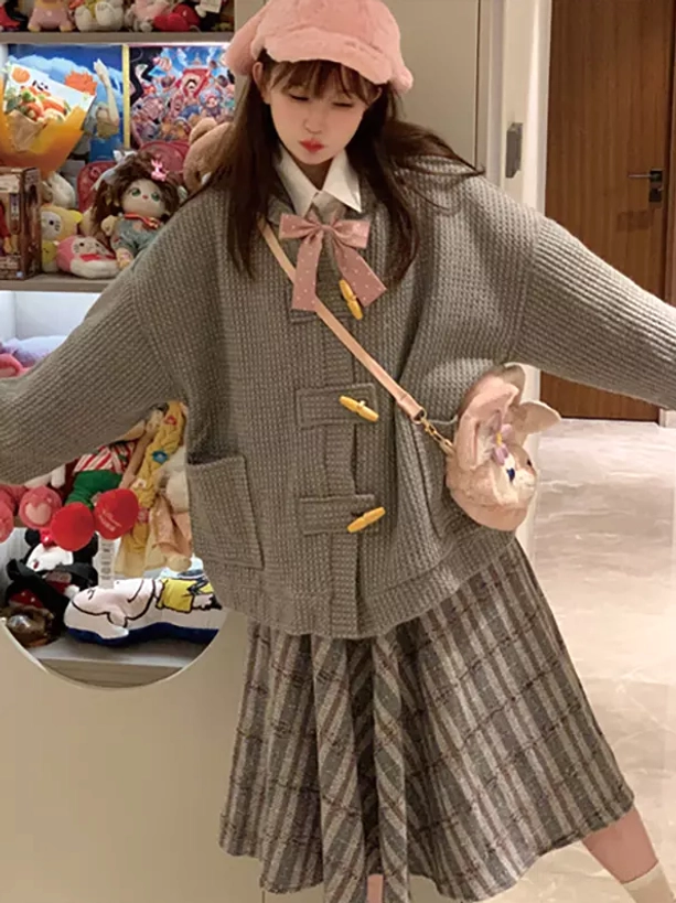 taupe waffle knit lolita toggle coat with horn buttons and bow necktie worn with pink baseball cap crossbody plush bag
