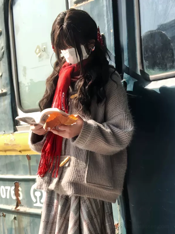 taupe sweet rococo lolita toggle coat with horn buttons and loose winter fit worn in car interior with red scarf and plaid skirt