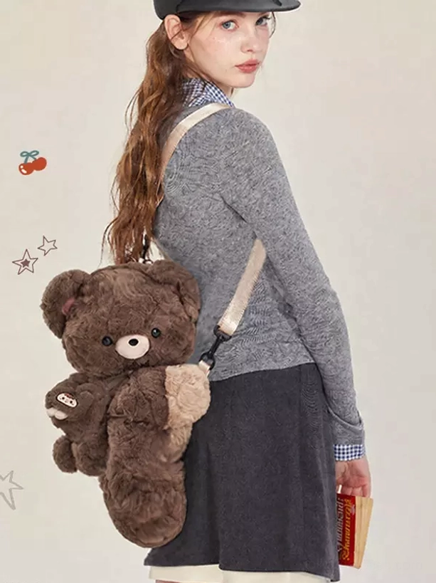 Sweet lolita teddy bear plush bag in dark brown corduroy with beige crossbody strap casually worn by model in casual coordinate
