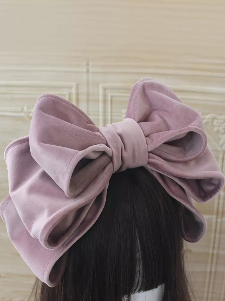 Velvet Lolita bow headdress with double-layer oversized design showcasing premium rococo-inspired construction, lace-up embellishment detail, and dimensional bow structure for authentic sweet lolita aesthetic