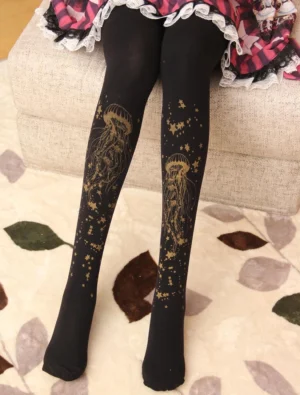 Gold jellyfish and star hot-stamped black velvet Lolita tights worn with frilly lace skirt front full-length view