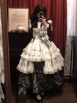 Victorian black and white maid lolita dress with multi-layer ruffle apron front mirror selfie view showing complete three-piece outfit