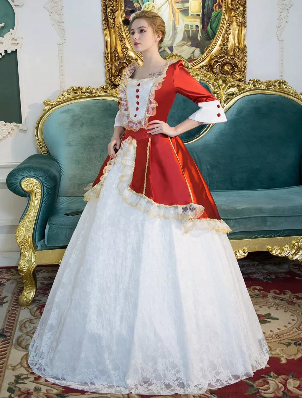 Victorian Lolita maid costume dress side perspective showing 3/4 length bell sleeves with lace cuffs, red buttons, square neckline, and layered lace skirt, worn by model on velvet sofa