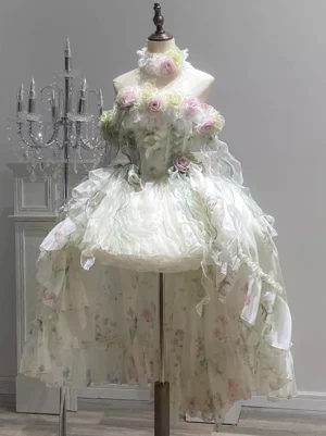 Vintage floral white Classic Lolita dress with halter neck and dramatic tulle train, front view on dress form