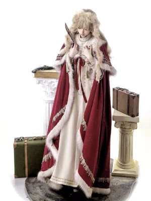 Vintage lolita winter cloak medium shot showing white fur trim red waist sash and beige inner dress coordinate
