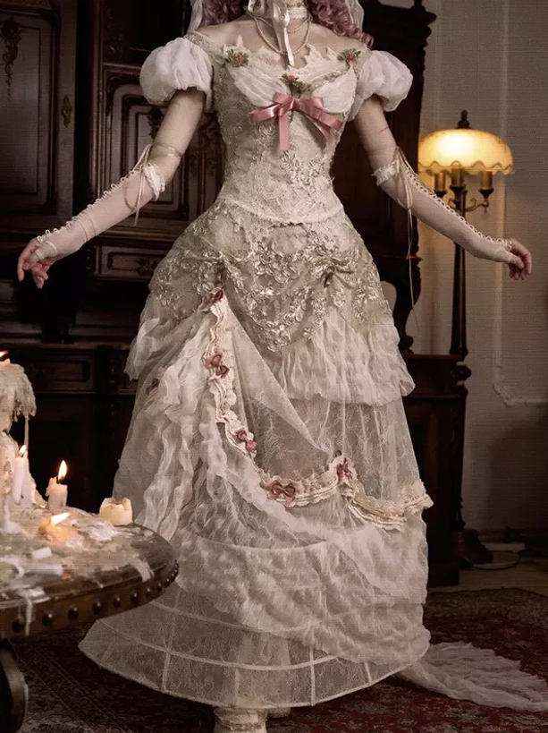Vintage victorian lolita wedding dress full front view with ivory lace puff sleeves pink chest bow and floral embroidery details