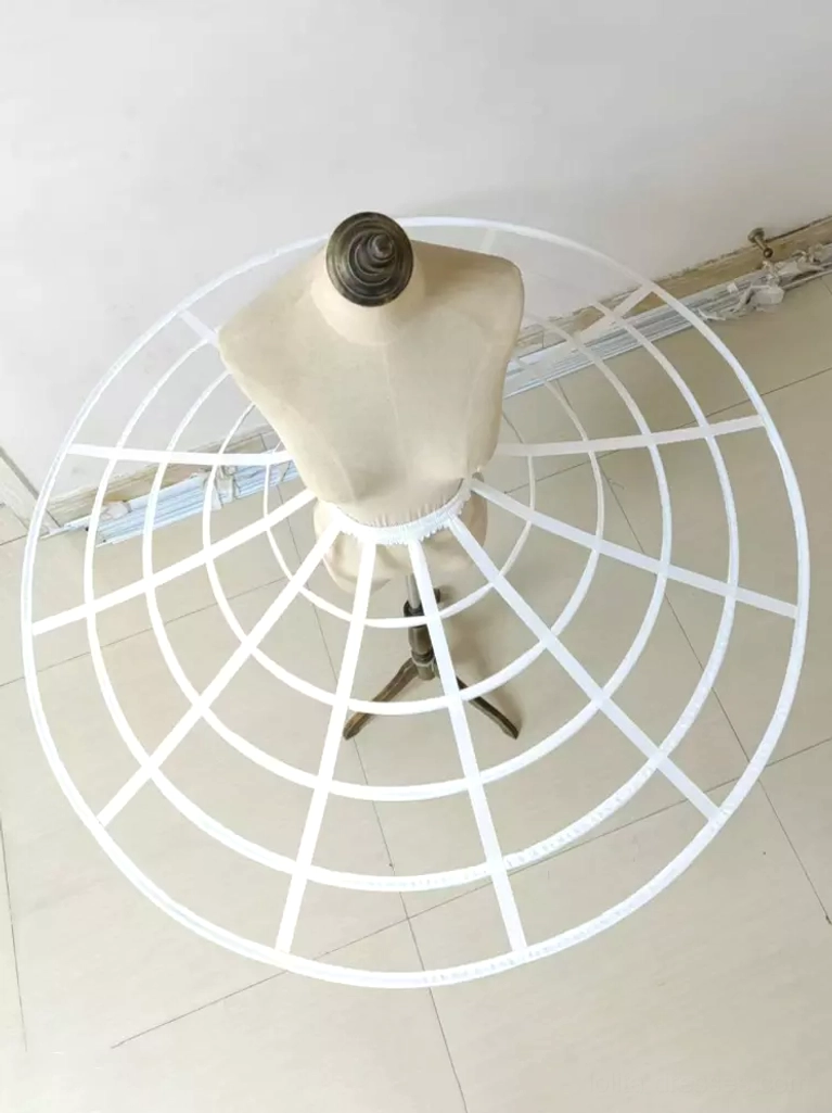 Right side three-quarter view of white ballet cage petticoat showing full wide hollow grid structure and graduated hoop sizing for lolita dress volume