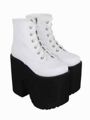 White and black gothic lolita platform boots rear three-quarter angle showing side zipper closure and chunky platform heel design