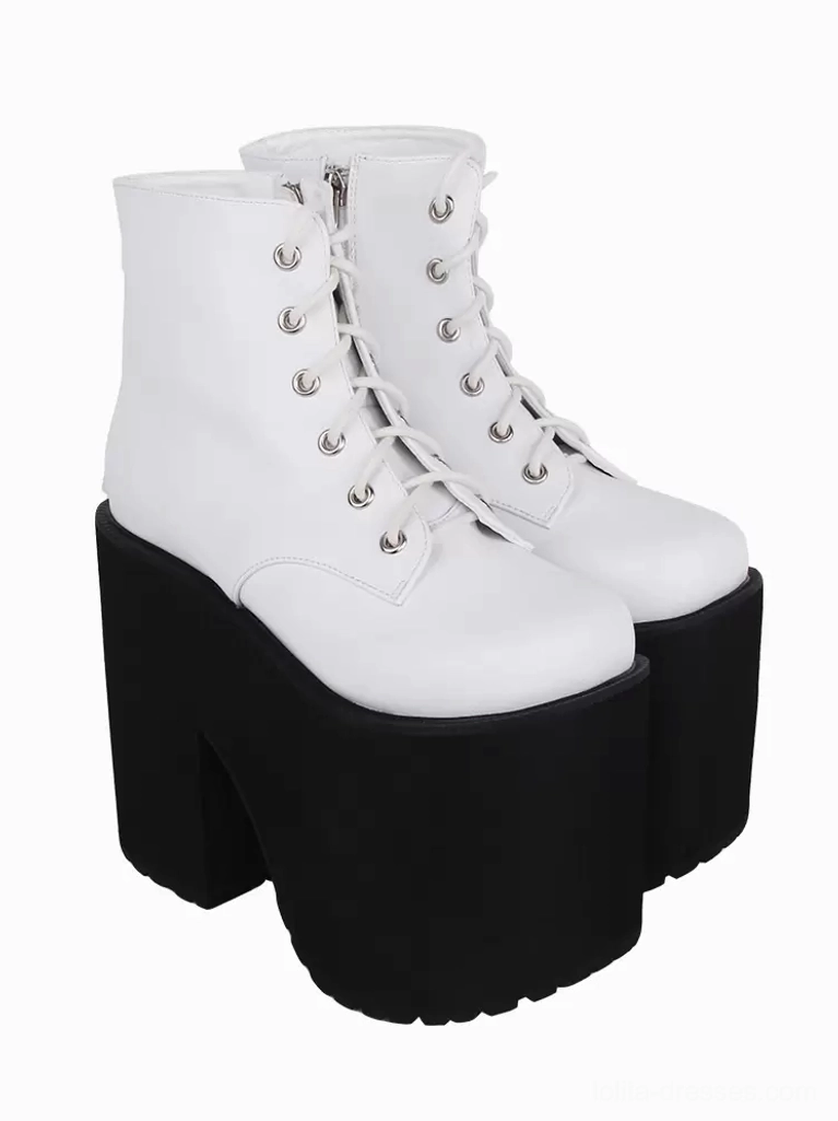 White and black gothic lolita platform boots rear three-quarter angle showing side zipper closure and chunky platform heel design